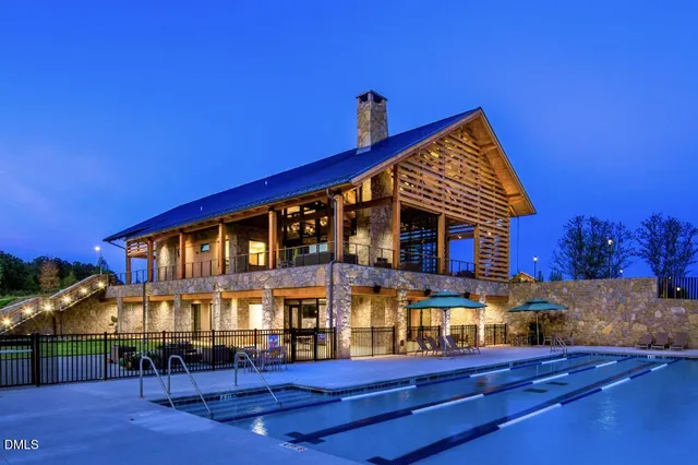 a front view of a house with yard