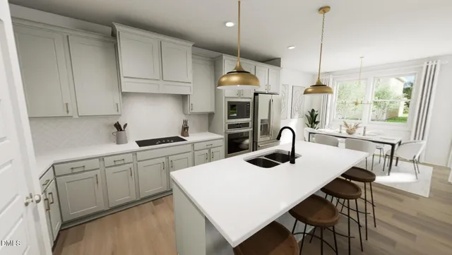 a kitchen with sink cabinets and dining table