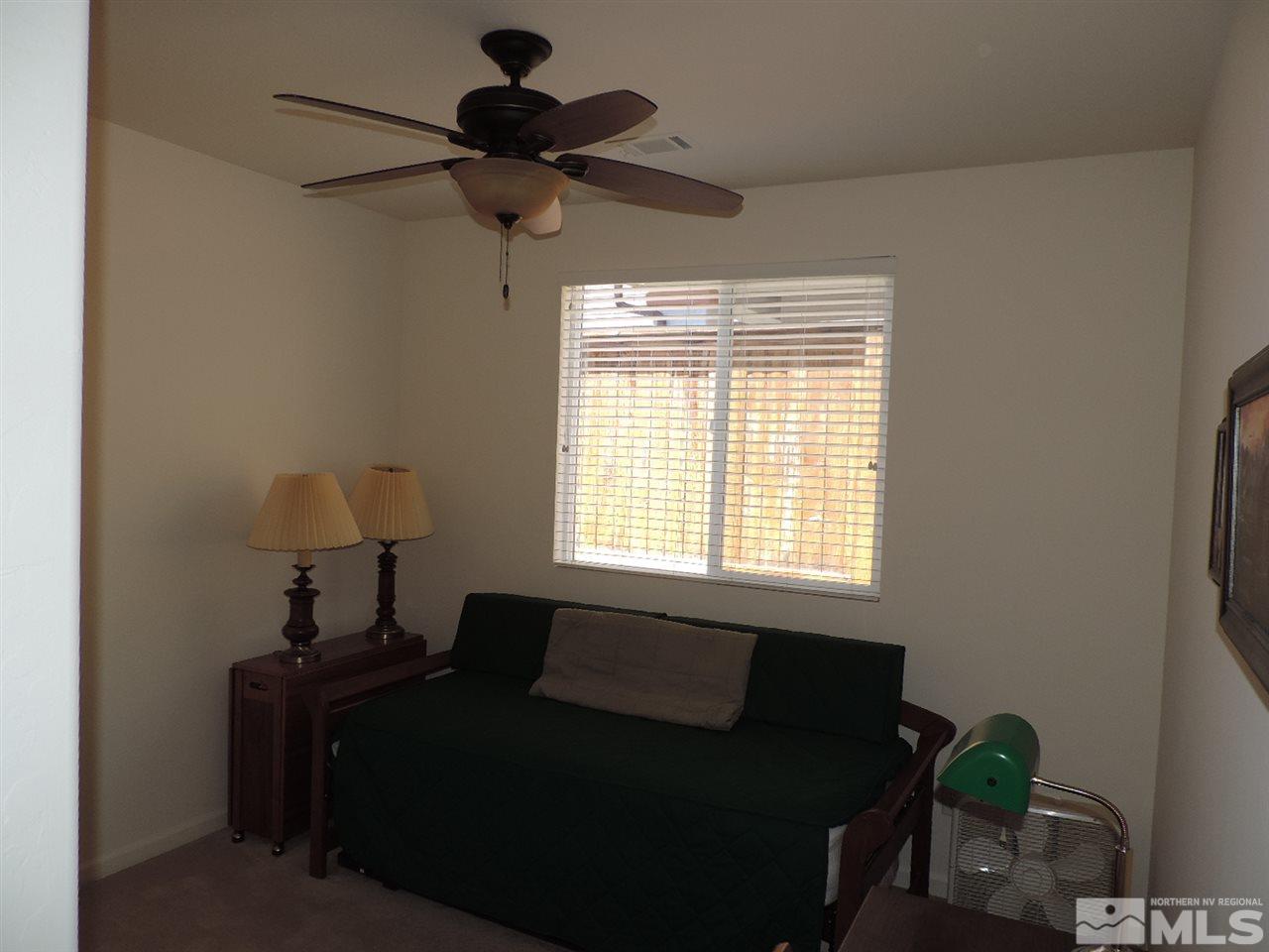 9101 Quilberry Way Reno, NV 89523 - Photo 18 of 20 a living room with furniture and a window