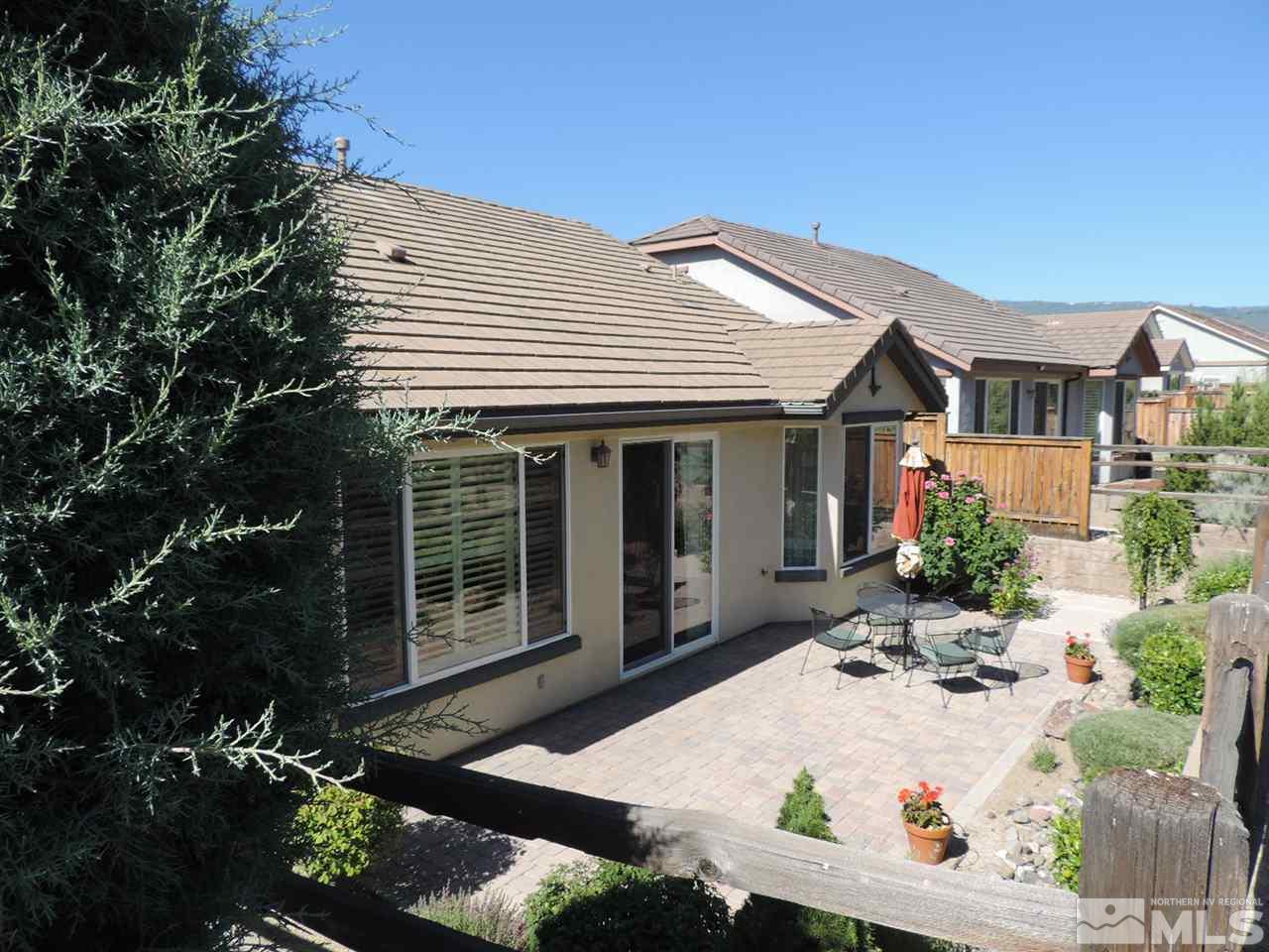9101 Quilberry Way Reno, NV 89523 - Photo 8 of 20 front view of a house with a patio