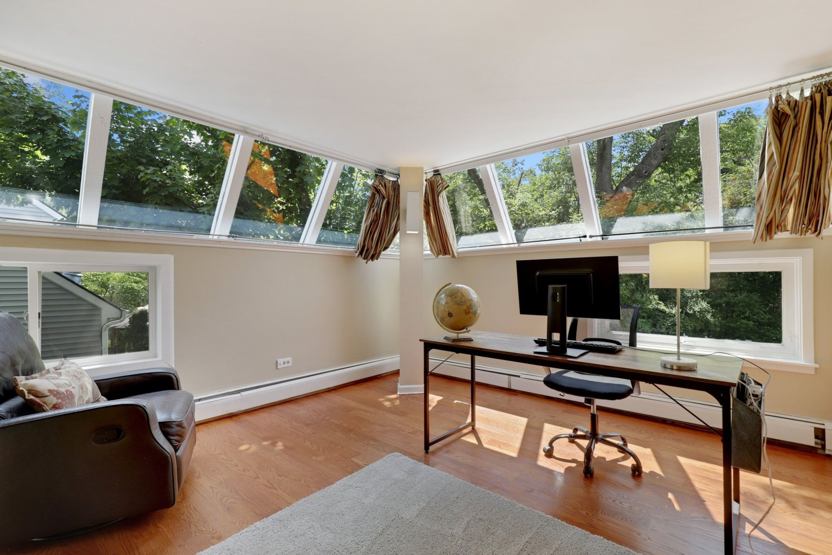 1010 South Summit Street Barrington, IL 60010 - Photo 12 of 48 a living room with furniture a window and a flat screen tv