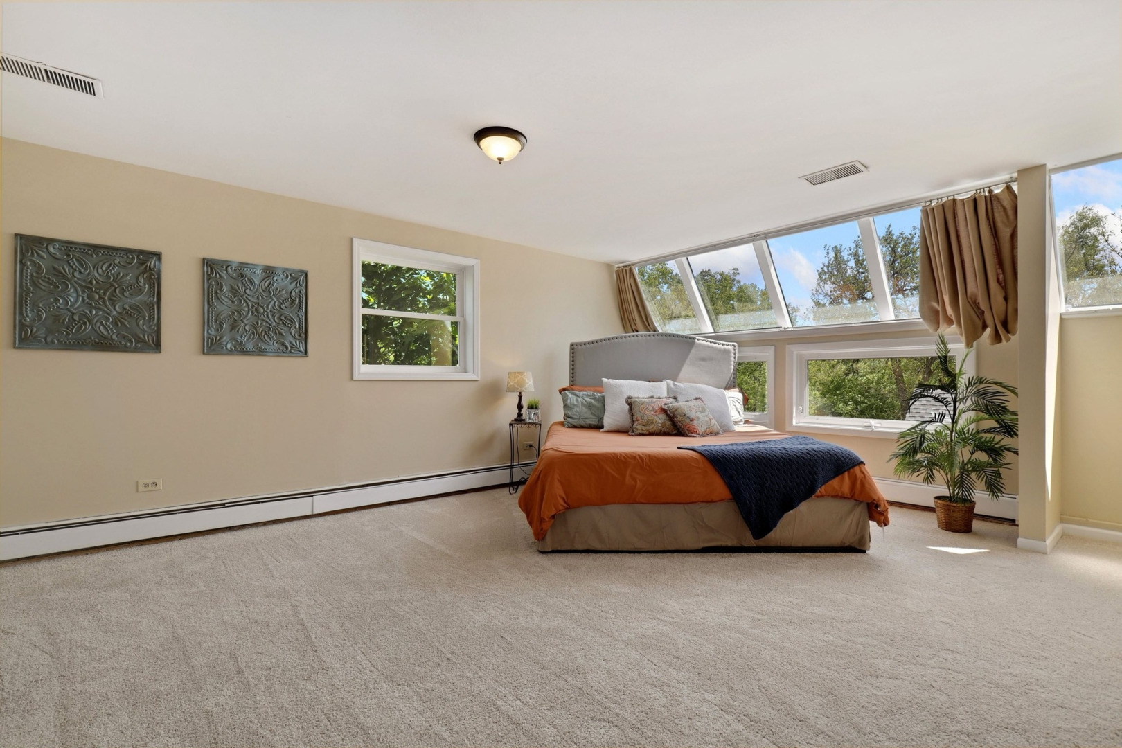 1010 South Summit Street Barrington, IL 60010 - Photo 15 of 48 a bedroom with a large bed and a window