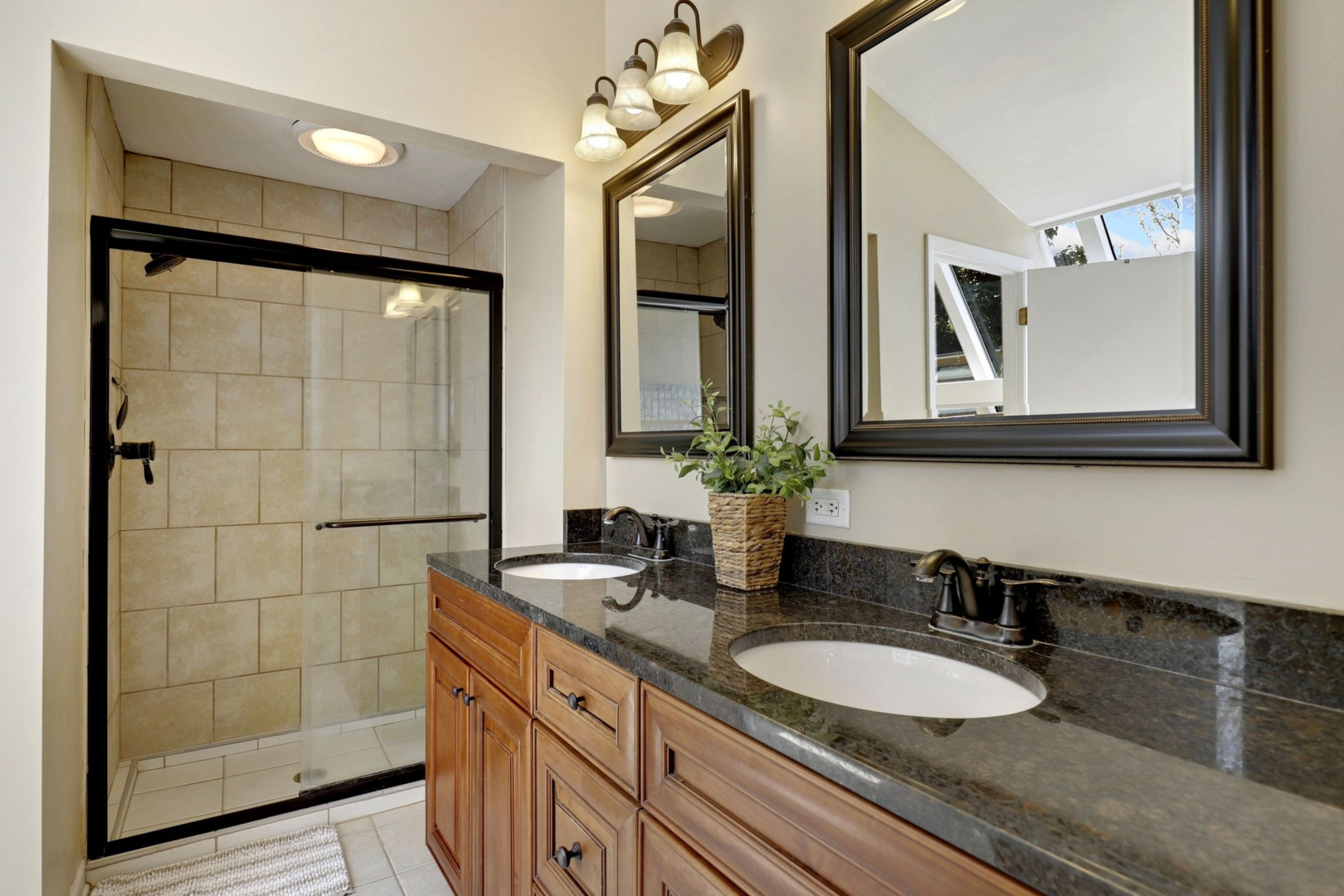 1010 South Summit Street Barrington, IL 60010 - Photo 18 of 48 a bathroom with a double vanity sink and a mirror
