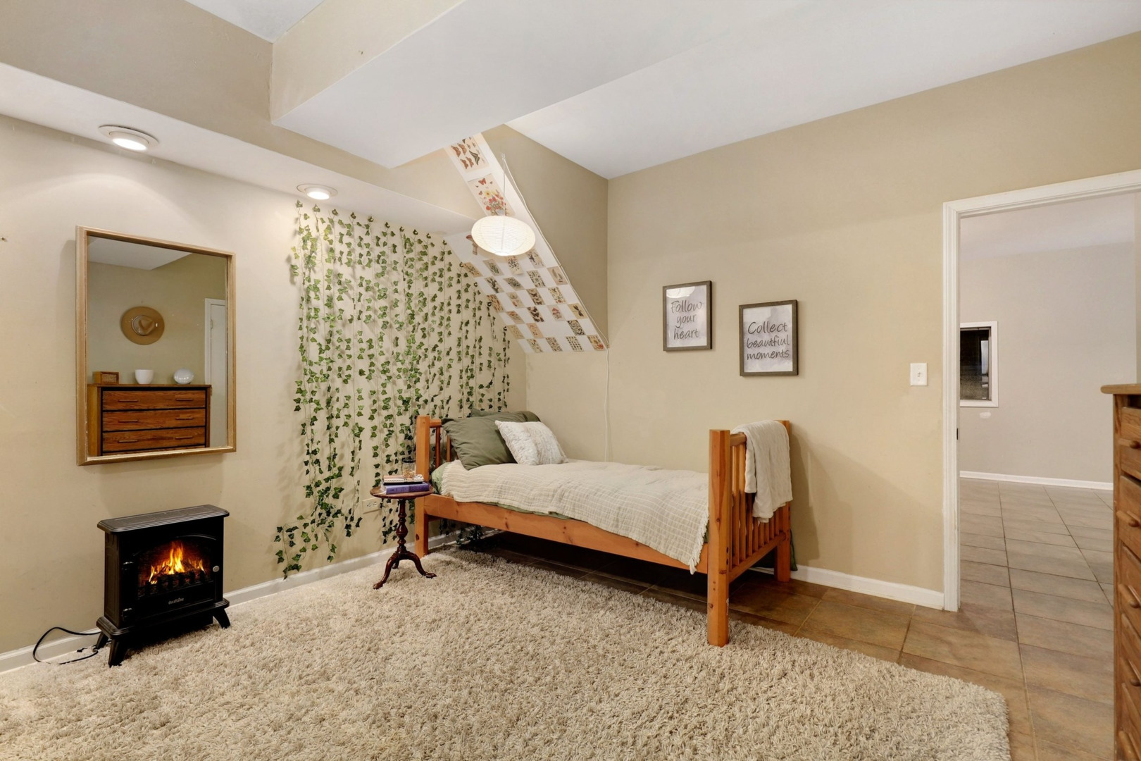 1010 South Summit Street Barrington, IL 60010 - Photo 36 of 48 a bedroom with a chair and a fireplace