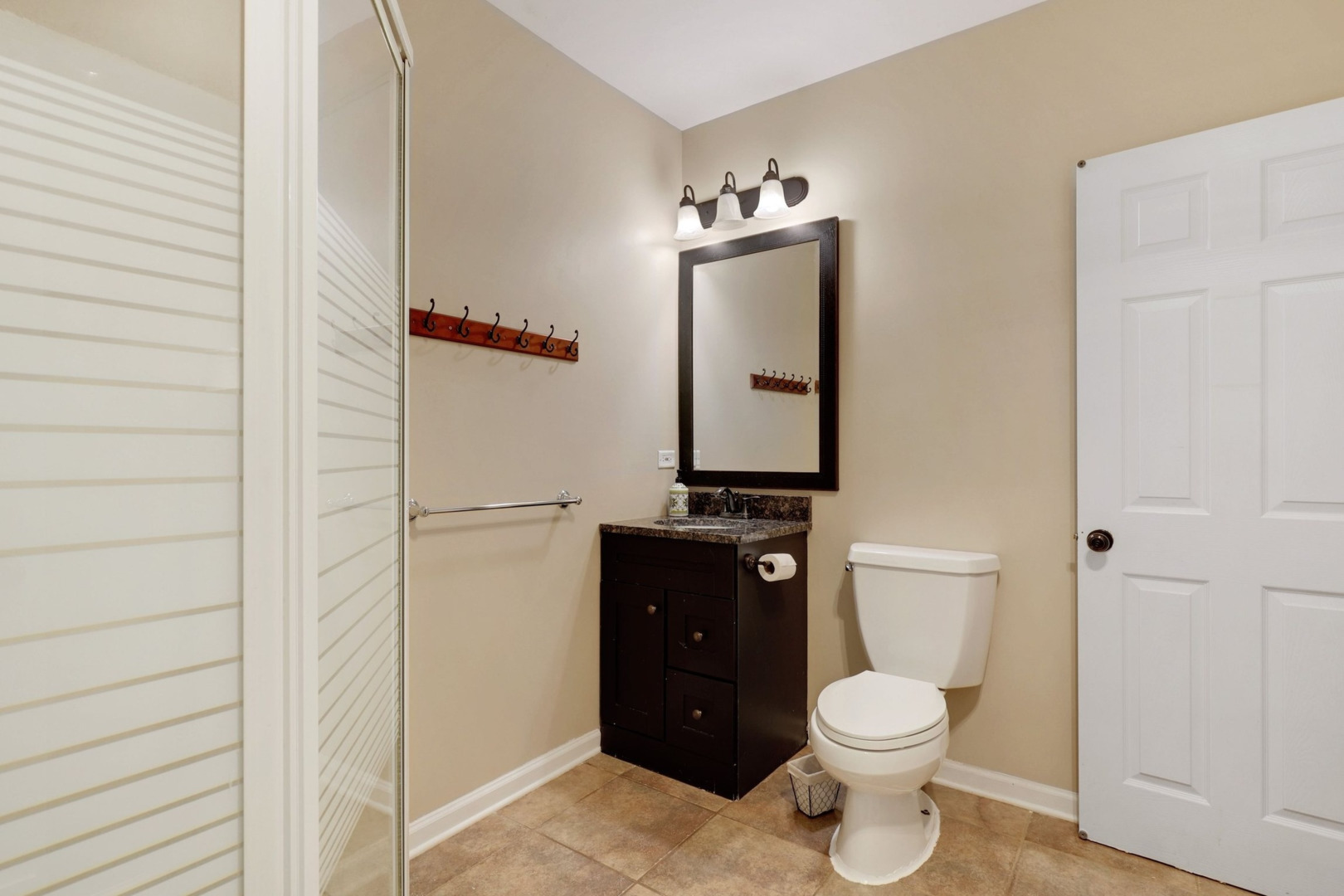 1010 South Summit Street Barrington, IL 60010 - Photo 37 of 48 a bathroom with a toilet and a shower