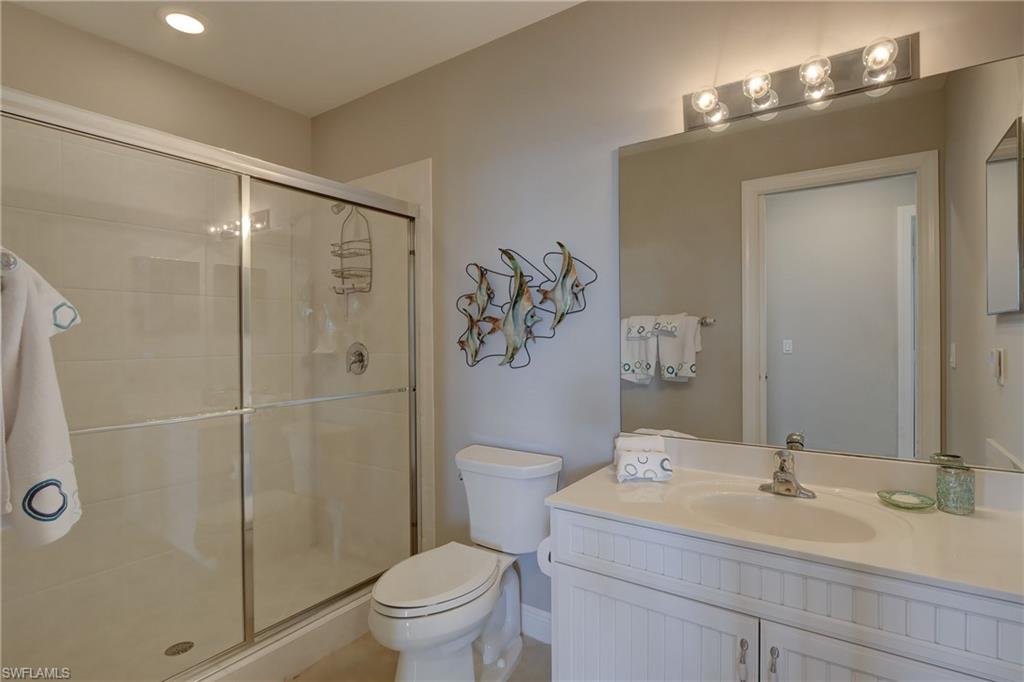 1857 San Marco Road, Unit PH3 Marco Island, FL 34145 - Photo 12 of 24 a bathroom with a sink toilet and shower