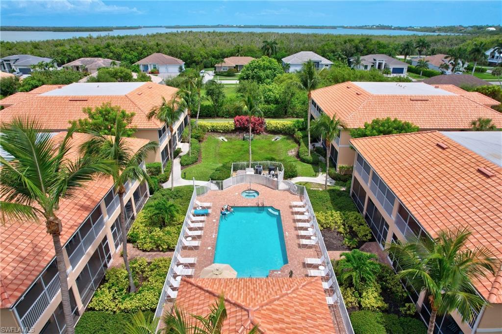 1857 San Marco Road, Unit PH3 Marco Island, FL 34145 - Photo 19 of 24 an aerial view of a house with yard