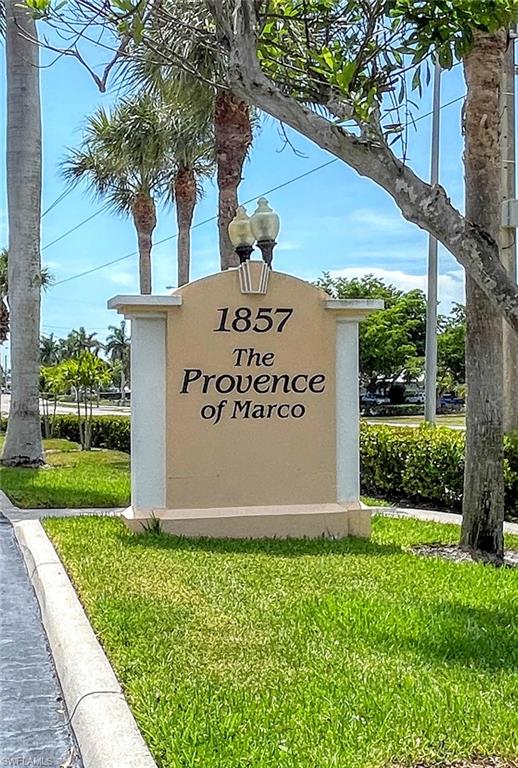 1857 San Marco Road, Unit PH3 Marco Island, FL 34145 - Photo 24 of 24 a sign on the side of the building