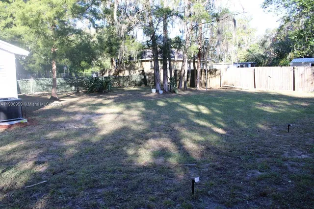 a view of road with trees