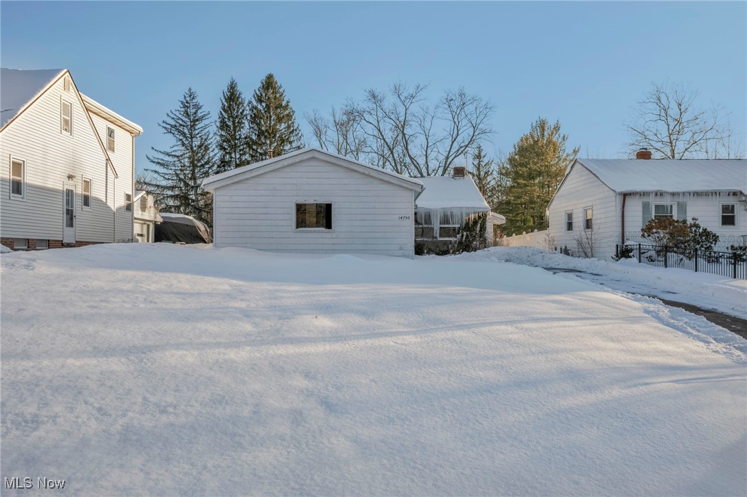 14750 Schreiber Road Maple Heights, OH 44137 - Photo 5 of 44 View of snow covered exterior