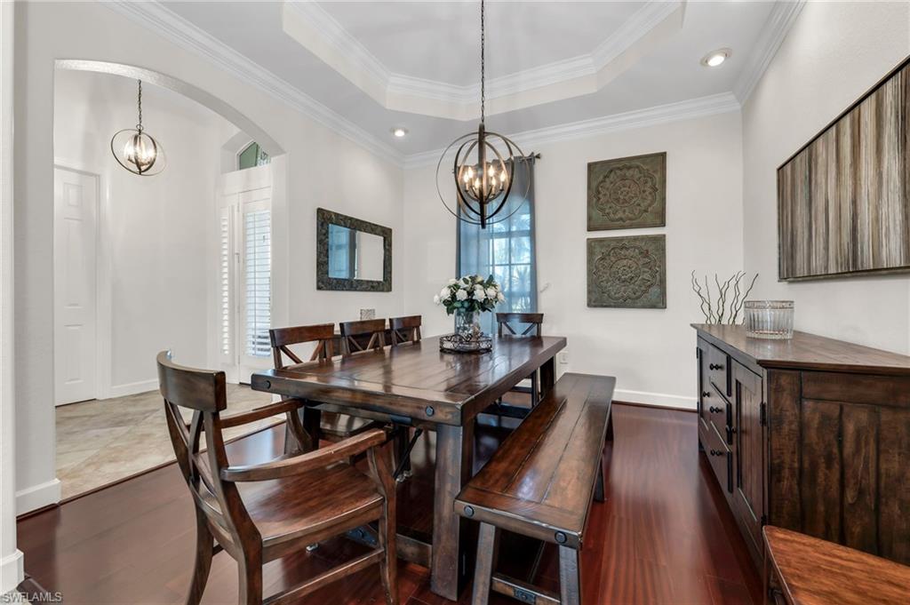 12080 Wicklow Lane Naples, FL 34120 - Photo 15 of 36 Dark Wood Floors, custom molding and natural light
