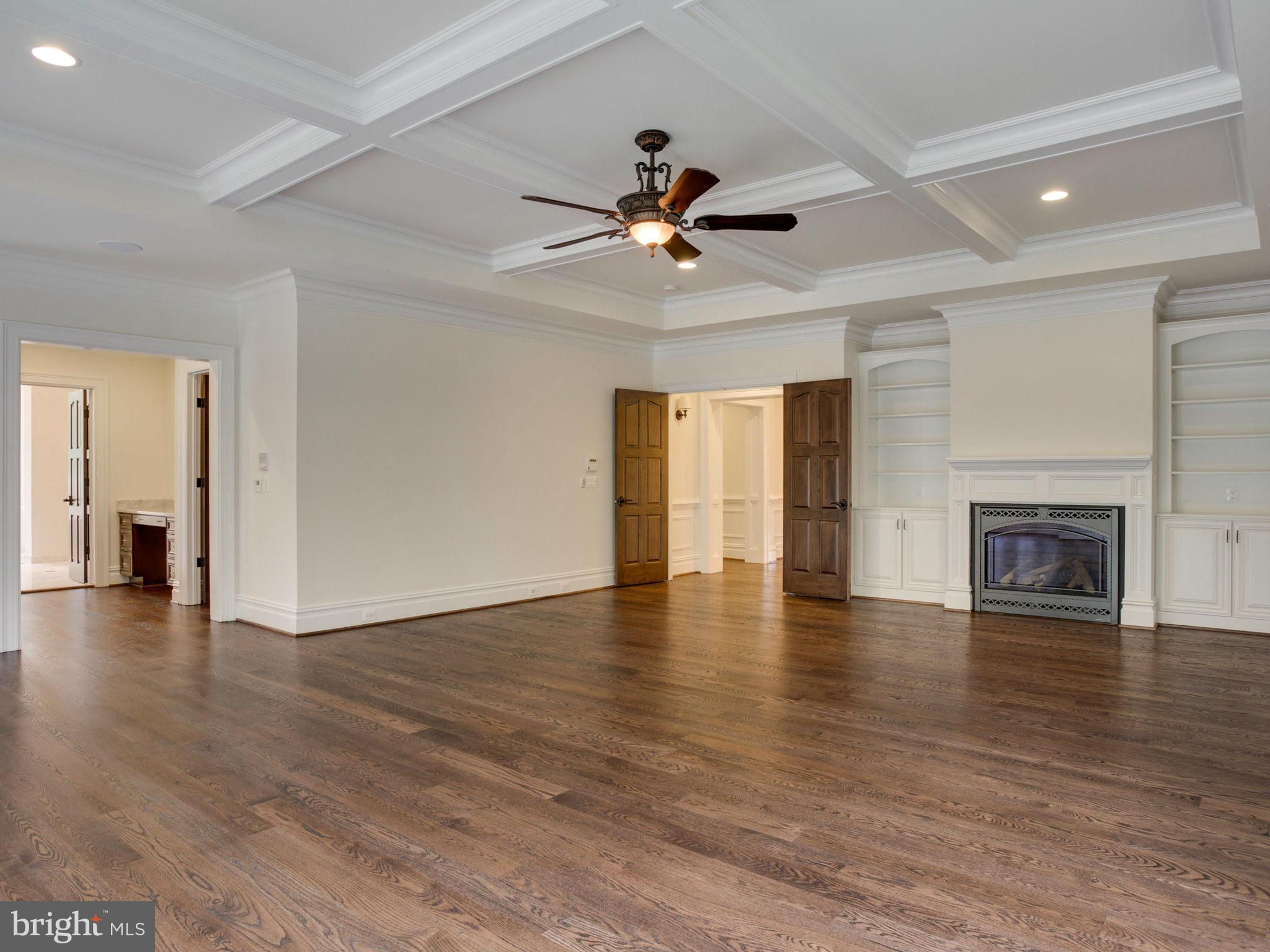 926 Douglass Drive McLean, VA 22101 - Photo 16 of 29 a view of empty room with wooden floor and fan