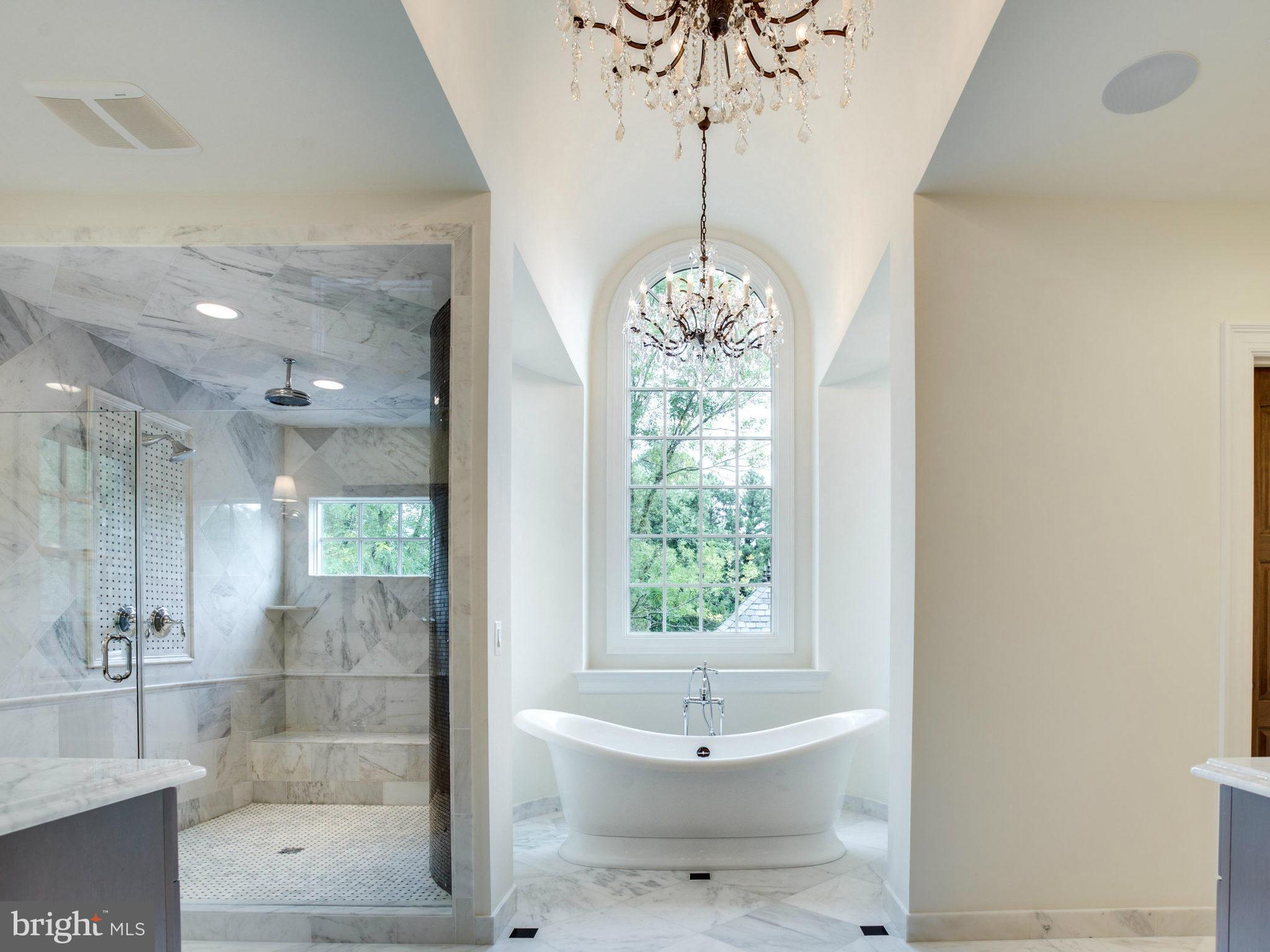 926 Douglass Drive McLean, VA 22101 - Photo 18 of 29 a bathroom with a bathtub shower and sink