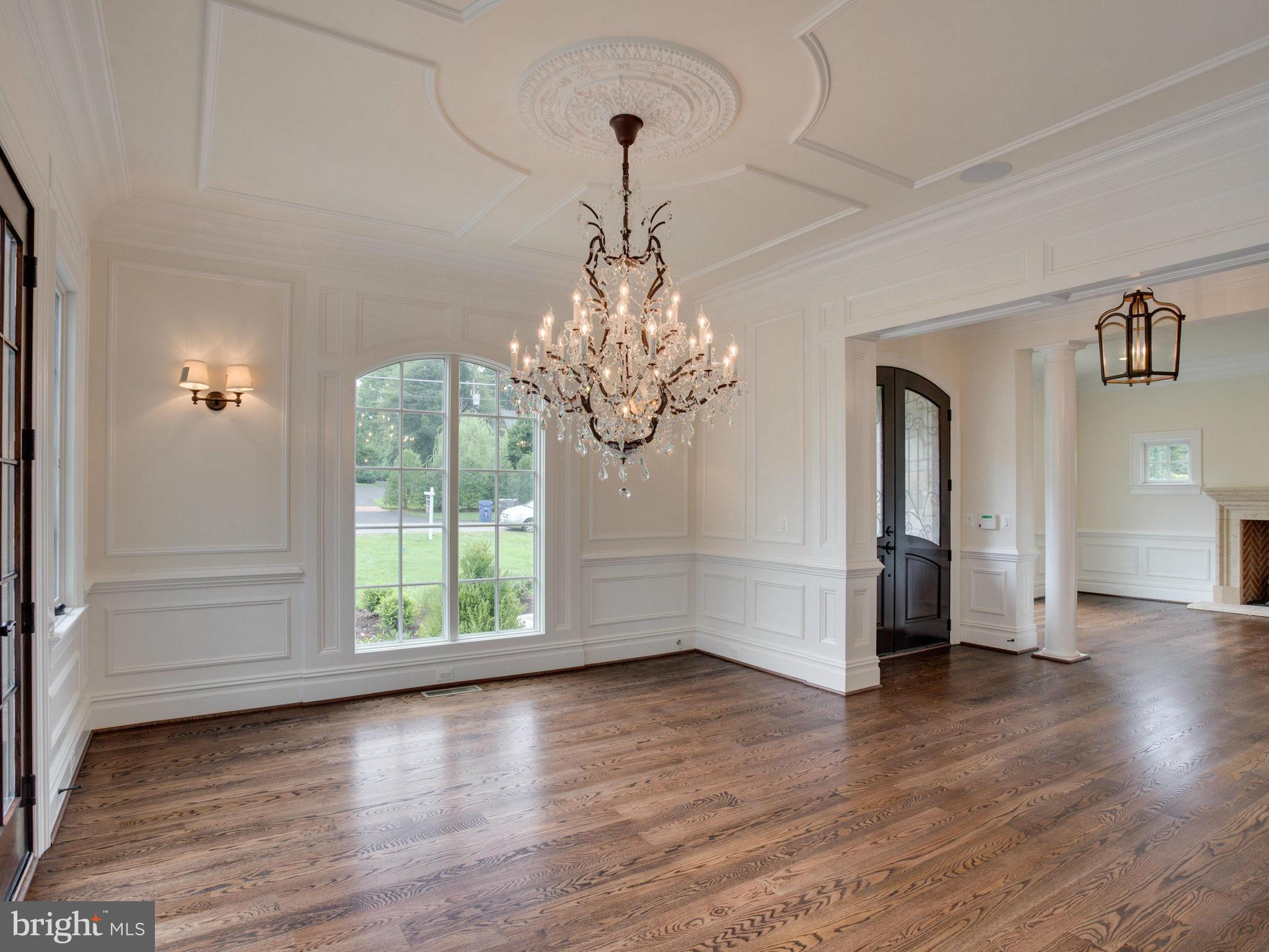 926 Douglass Drive McLean, VA 22101 - Photo 3 of 29 a view of a room with wooden floor chandelier and windows