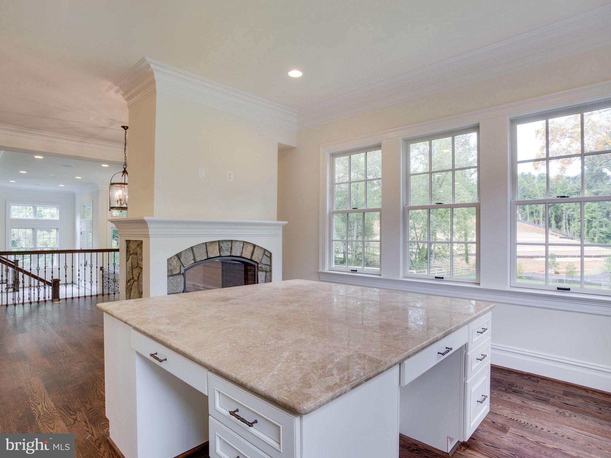 926 Douglass Drive McLean, VA 22101 - Photo 7 of 29 a view of a kitchen cabinets a sink and wooden floor