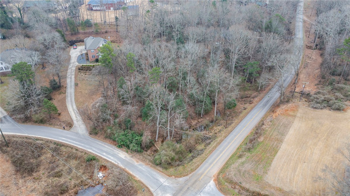 0 Standing Springs Road Greenville, SC 29605 - Photo 3 of 25 This spacious lot offers ample room for development, featuring a tranquil setting and convenient road access.