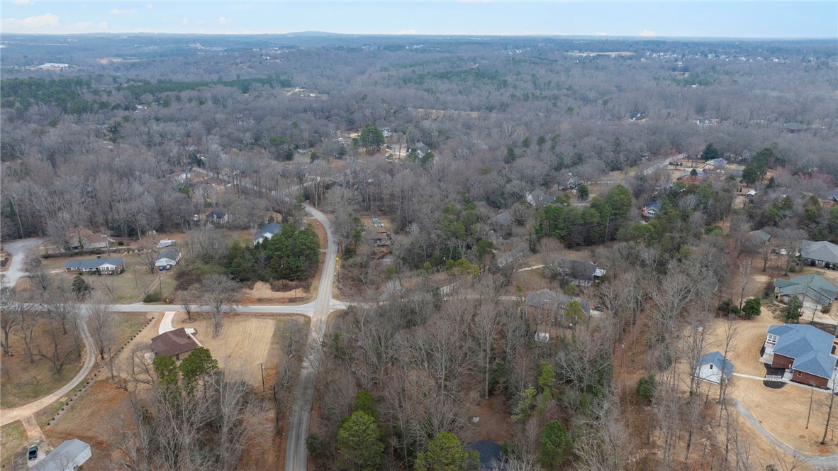 0 Standing Springs Road Greenville, SC 29605 - Photo 10 of 25 This elevated perspective showcases the extensive natural landscape surrounding the homes.