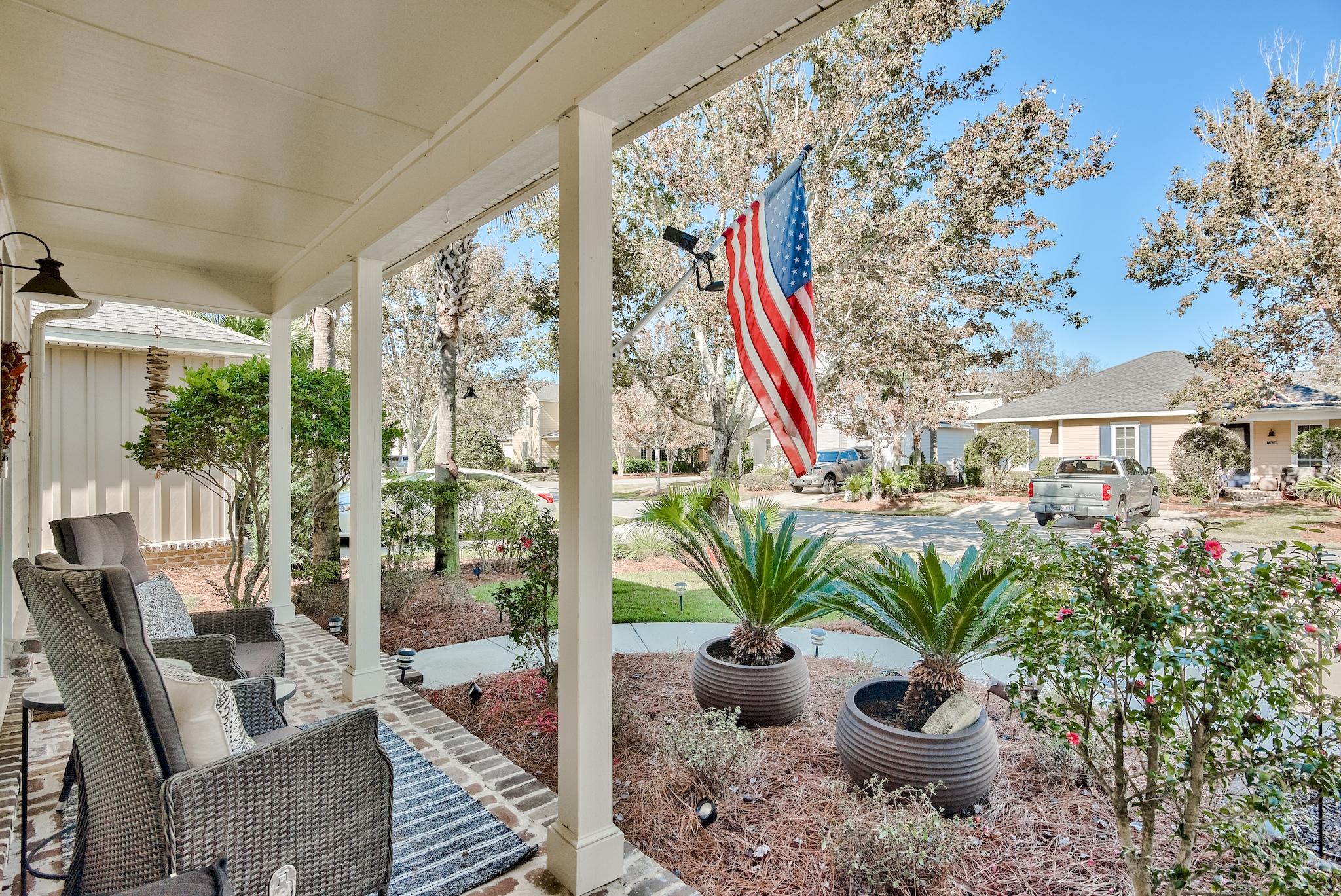 171 South Zander Way Santa Rosa Beach, FL 32459 - Photo 3 of 32 a view of balcony with furniture and garden