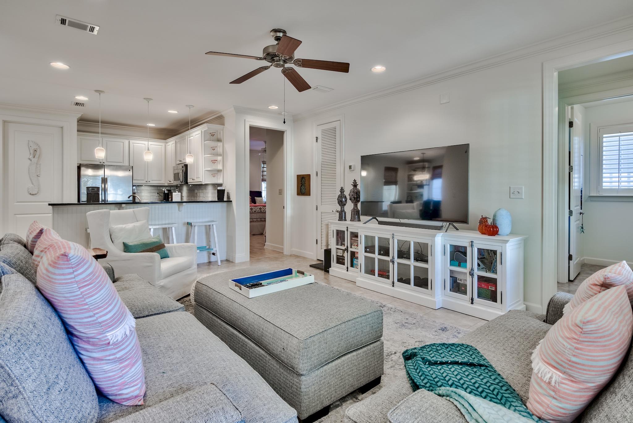 171 South Zander Way Santa Rosa Beach, FL 32459 - Photo 8 of 32 a living room with furniture and a large window