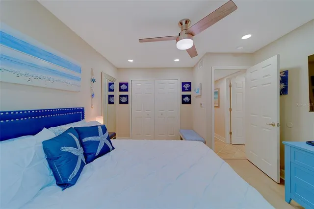 a group of people standing around a fruit stand