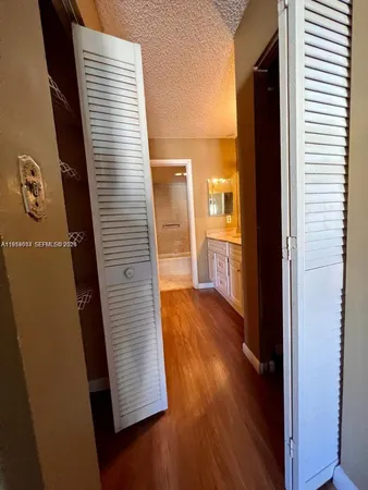 a view of a room with racks on the wall