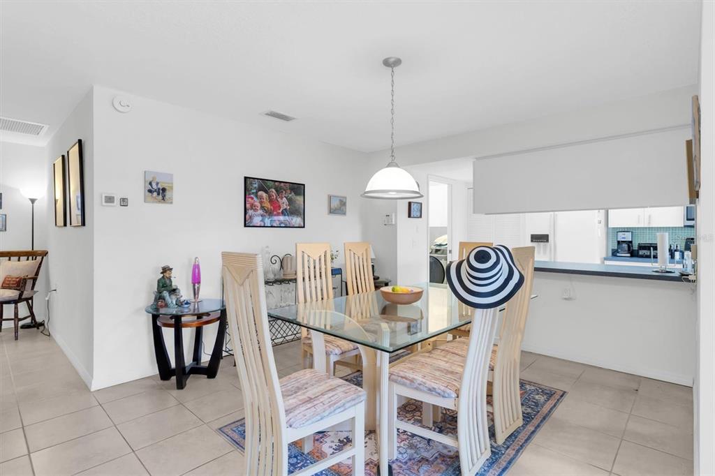 9052 Arundle Place New Port Richey, FL 34655 - Photo 6 of 57 a view of a kitchen and dining room
