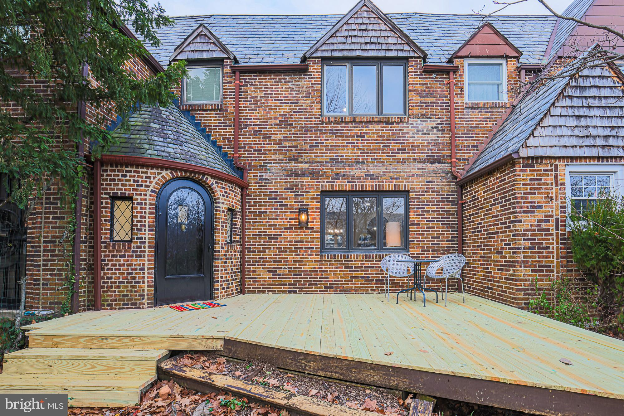 3716 Rexmere Road Baltimore, MD 21218 - Photo 1 of 54 a front view of a house with outdoor seating
