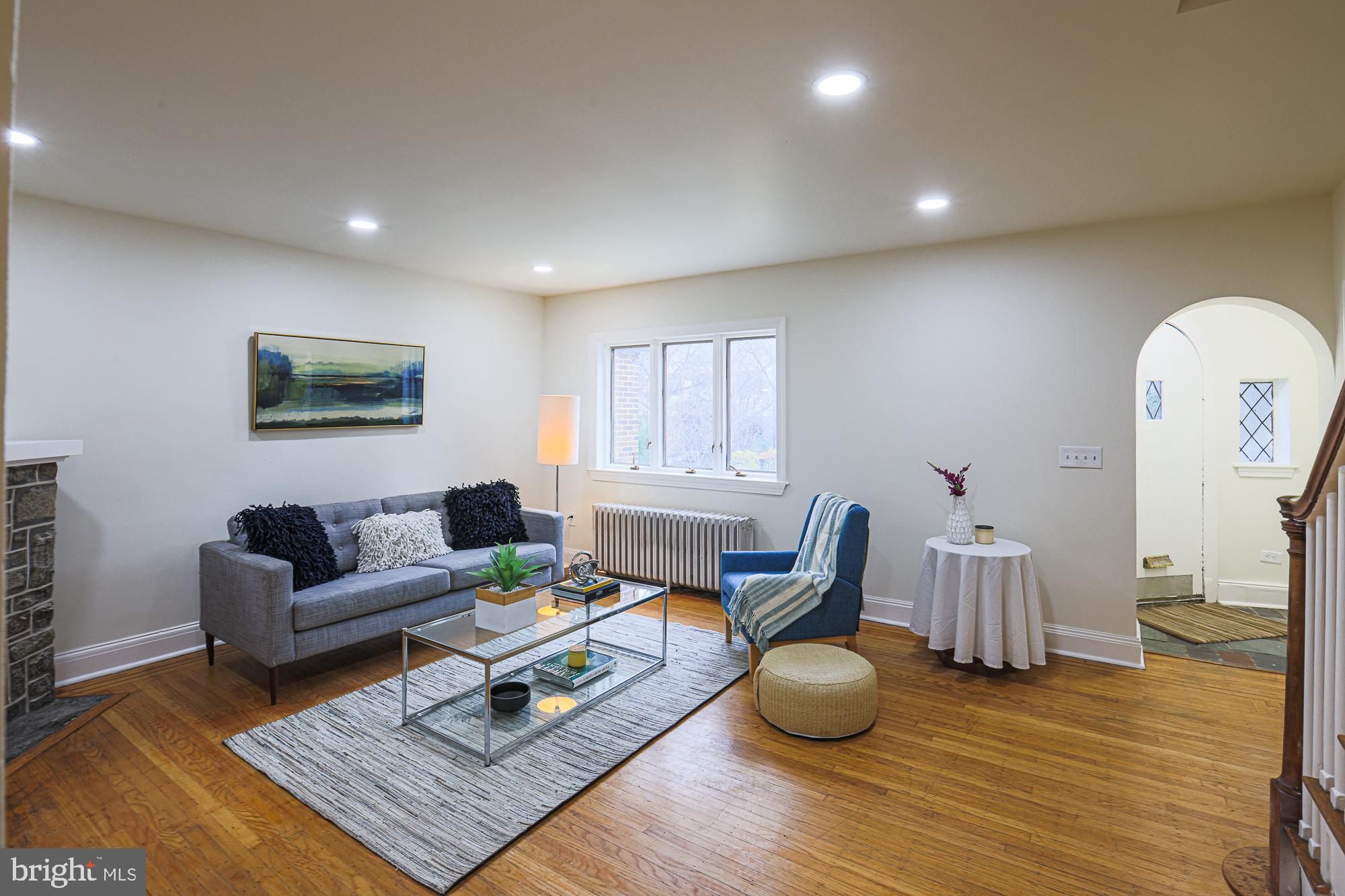 3716 Rexmere Road Baltimore, MD 21218 - Photo 11 of 54 a living room with furniture and wooden floor