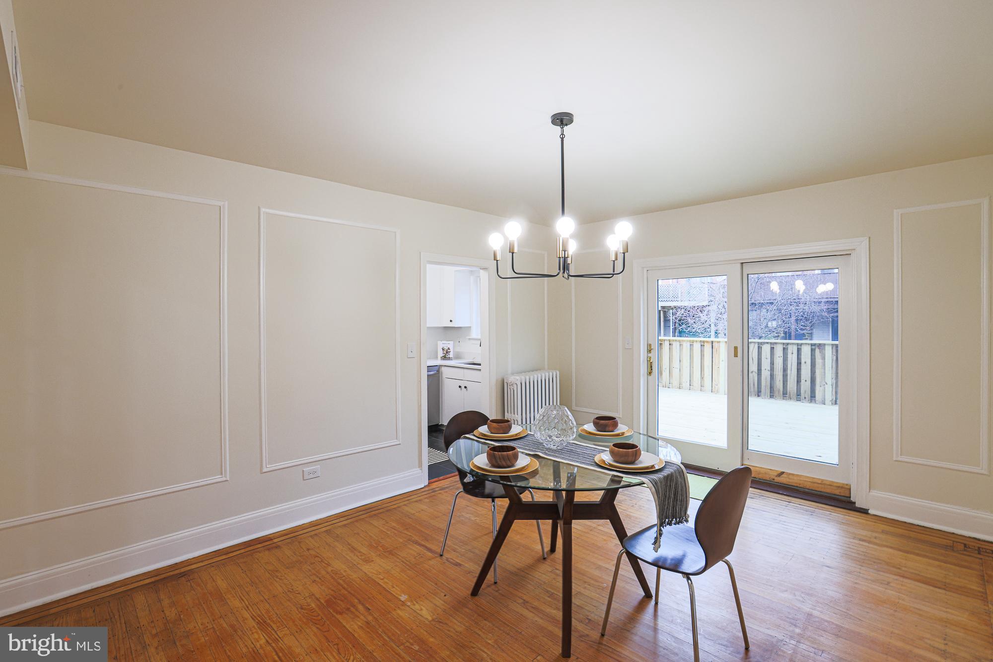 3716 Rexmere Road Baltimore, MD 21218 - Photo 19 of 54 a view of a livingroom with furniture and chandelier