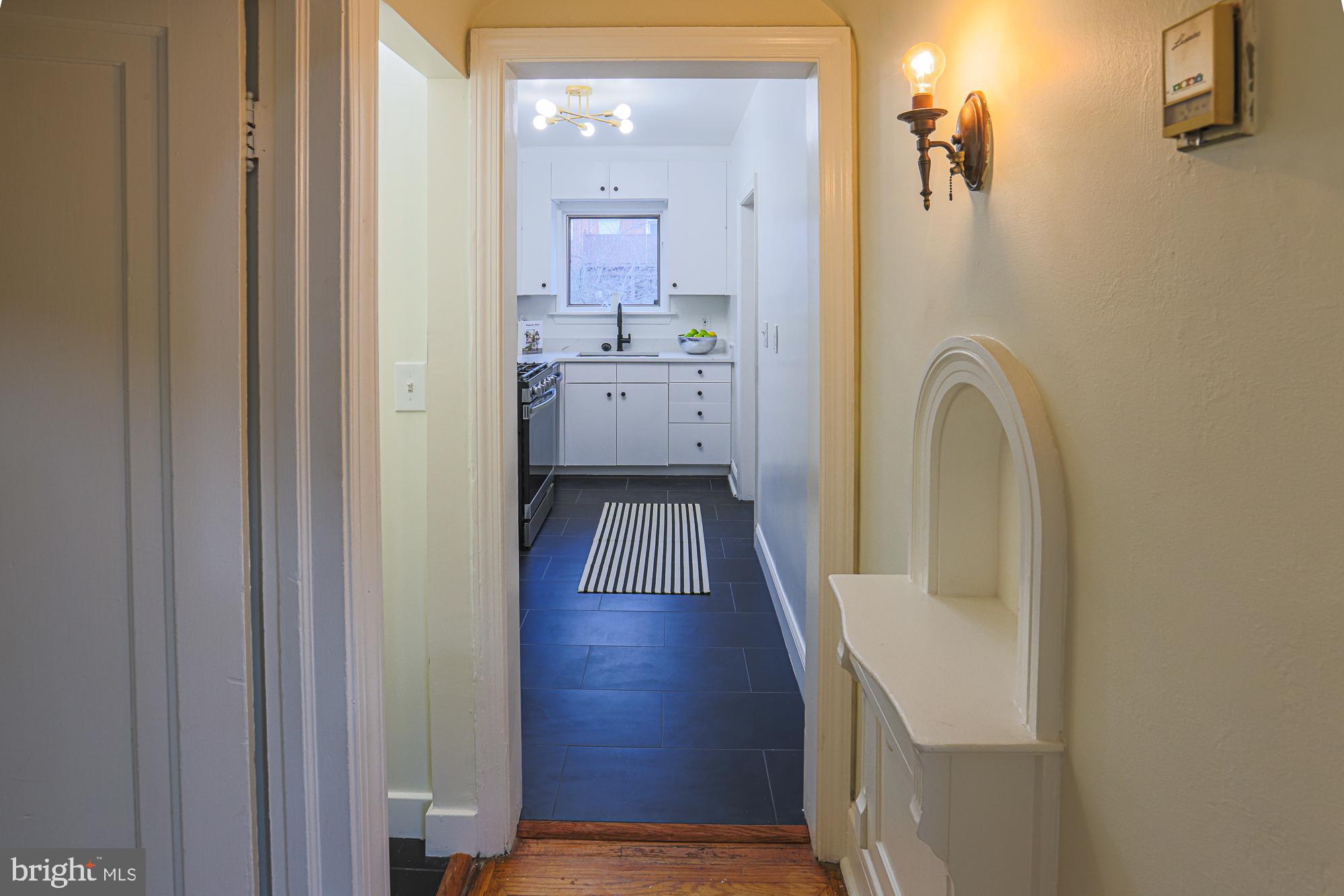 3716 Rexmere Road Baltimore, MD 21218 - Photo 27 of 54 a view of a bathroom from the hallway