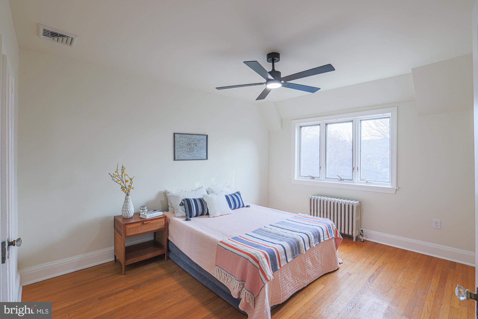 3716 Rexmere Road Baltimore, MD 21218 - Photo 28 of 54 a bedroom with a bed and a window