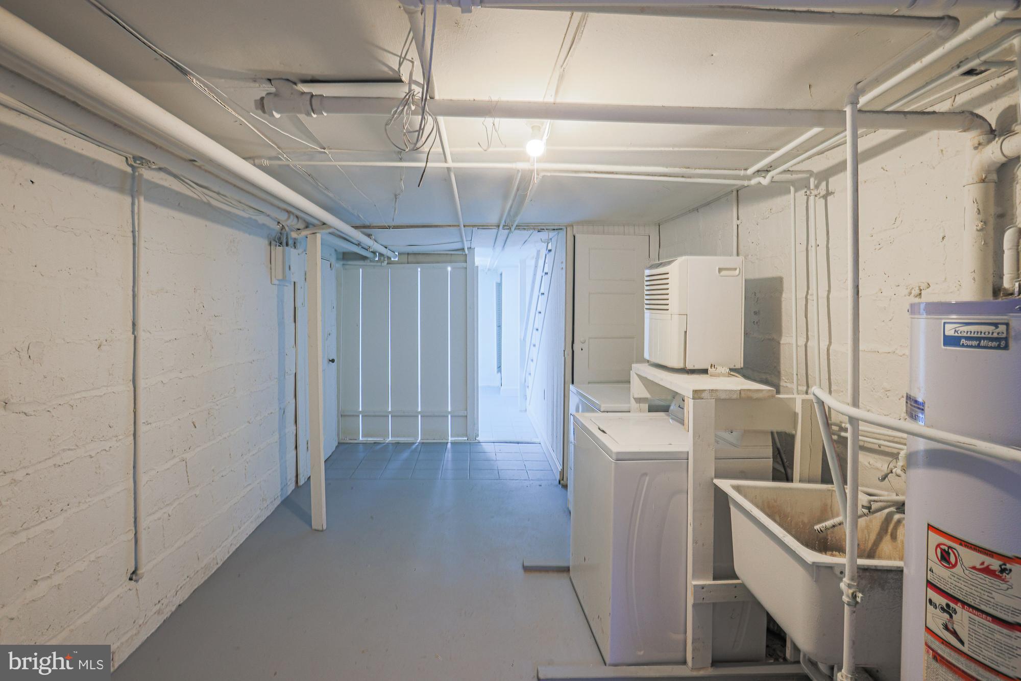3716 Rexmere Road Baltimore, MD 21218 - Photo 46 of 54 a utility room with dryer and washer