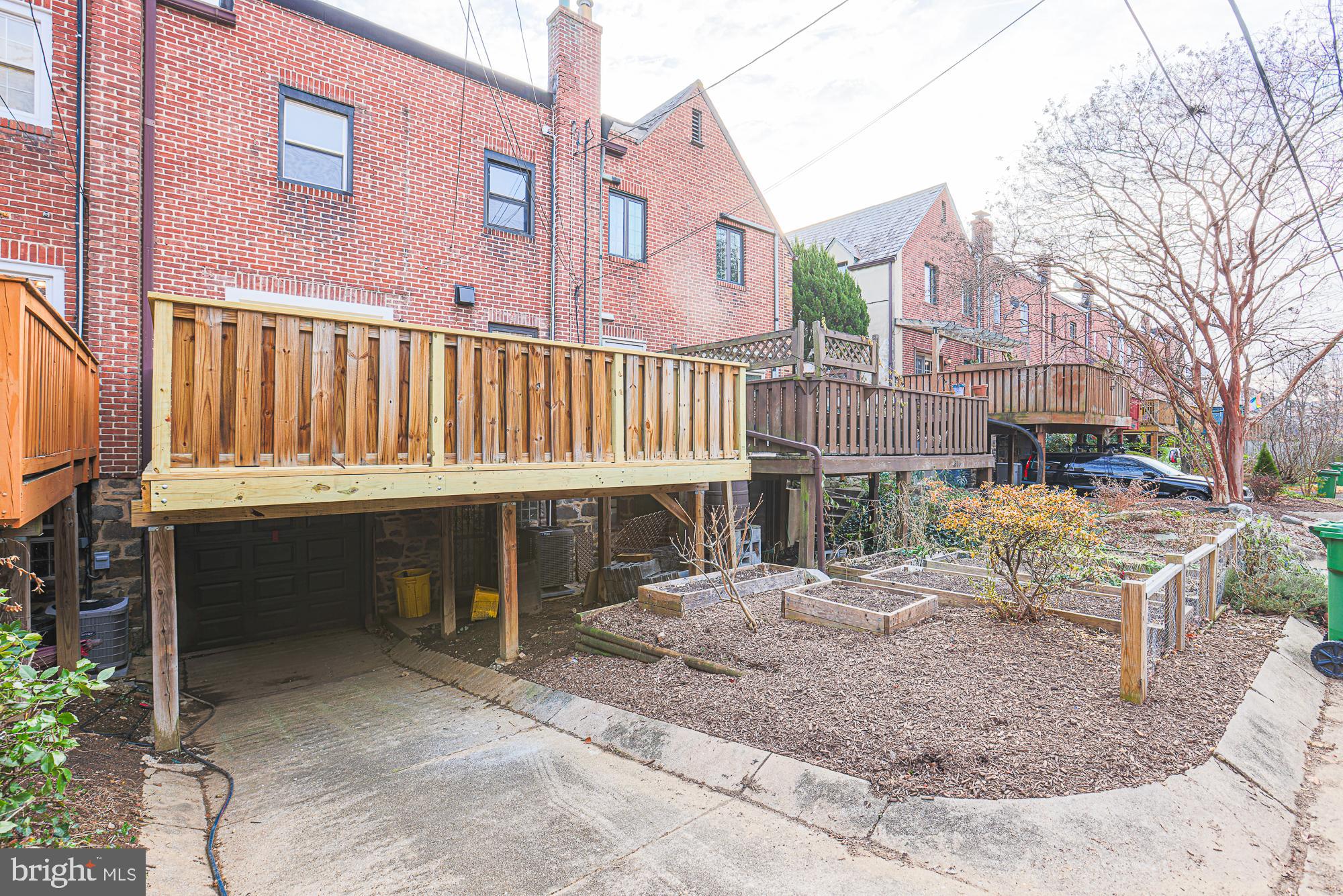 3716 Rexmere Road Baltimore, MD 21218 - Photo 50 of 54 a view of a house with a yard and furniture