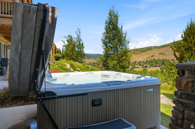 3148 Lower Saddleback Road Park City, UT 84098 - Photo 55 of 67 Outdoor spa featuring a light-colored shell, ribbed paneling, and a cover lift system