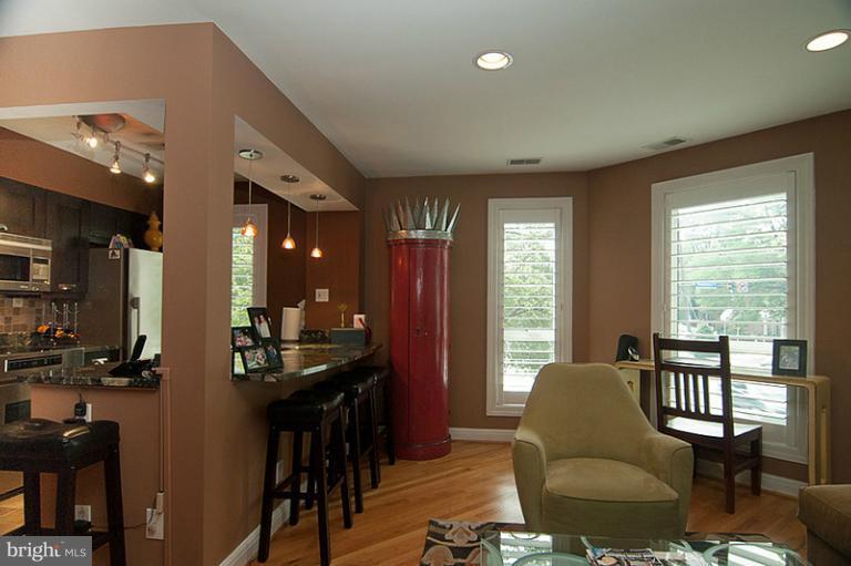 4822 Hampden Lane, Unit R Bethesda, MD 20814 - Photo 3 of 22 Kitchen & Living Area with lots of natural light