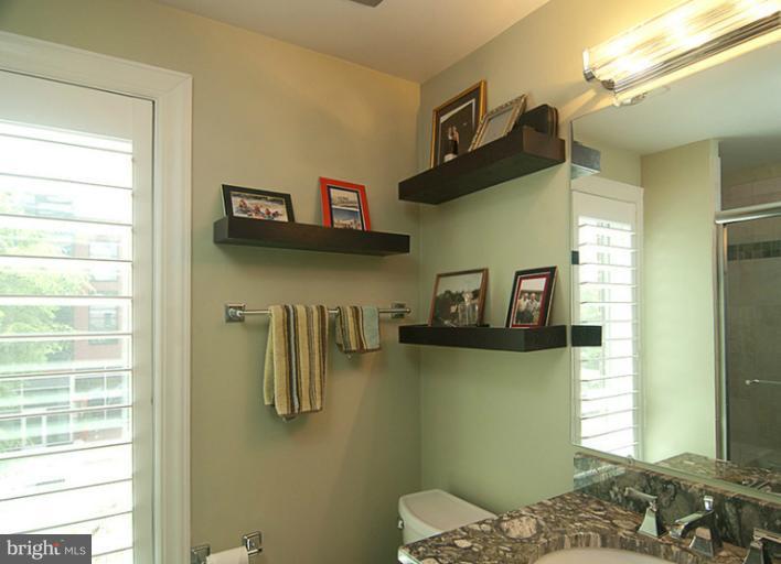 4822 Hampden Lane, Unit R Bethesda, MD 20814 - Photo 21 of 22 Master Bath with glass enclosed shower