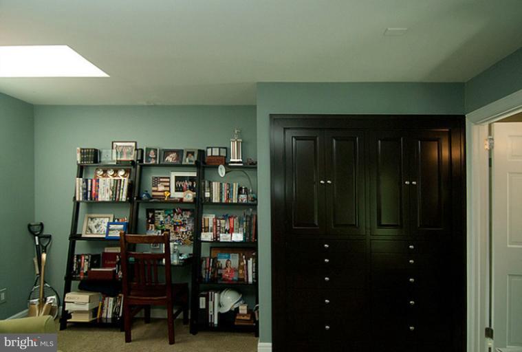 4822 Hampden Lane, Unit R Bethesda, MD 20814 - Photo 4 of 22 Master Bedroom with built-in dresser & desk area