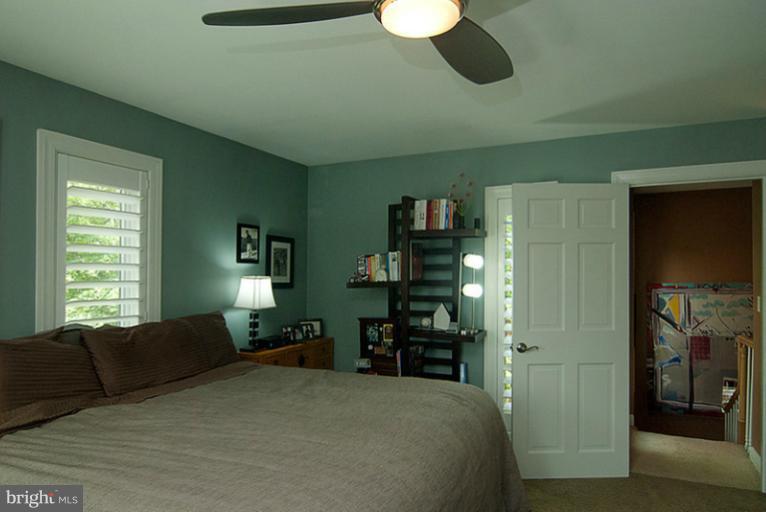 4822 Hampden Lane, Unit R Bethesda, MD 20814 - Photo 10 of 22 Master Bedroom with ceiling fan