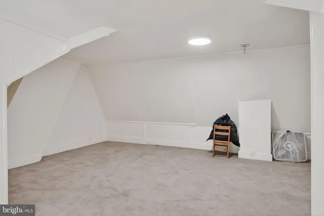a view of room with air conditioner and view of living room