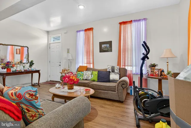 a living room with furniture or couch and a flat screen tv