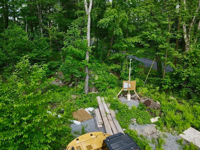 a view of swimming pool with outdoor seating