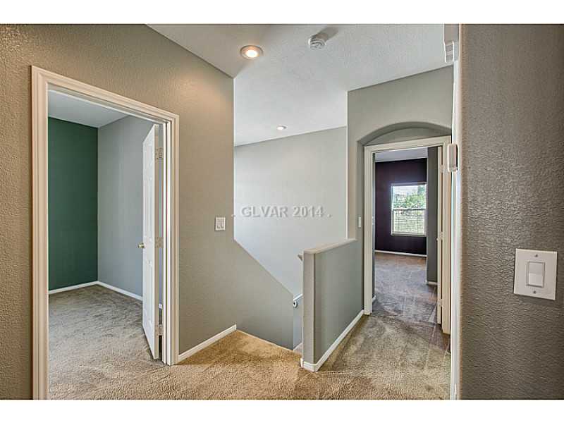 270 Liberty Point Court Henderson, NV 89052 - Photo 24 of 34 Property Photo. Upstairs landing and hallway