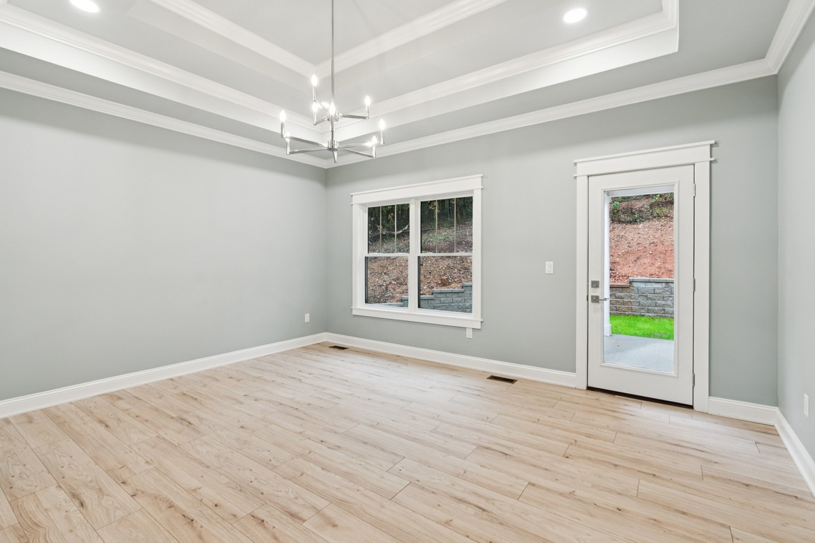 6461 Highway 48 North Cumberland Furnace, TN 37051 - Photo 15 of 25 a view of an empty room with a window and wooden floor