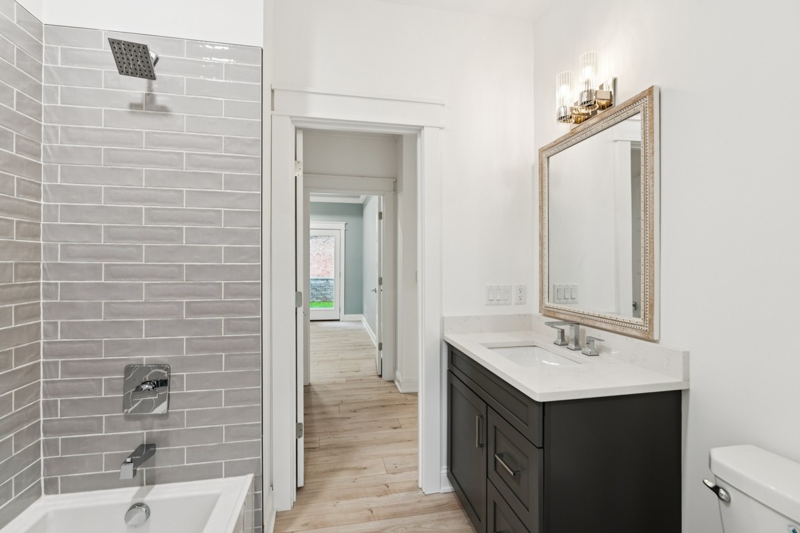 6461 Highway 48 North Cumberland Furnace, TN 37051 - Photo 22 of 25 a bathroom with a sink a mirror and a shower