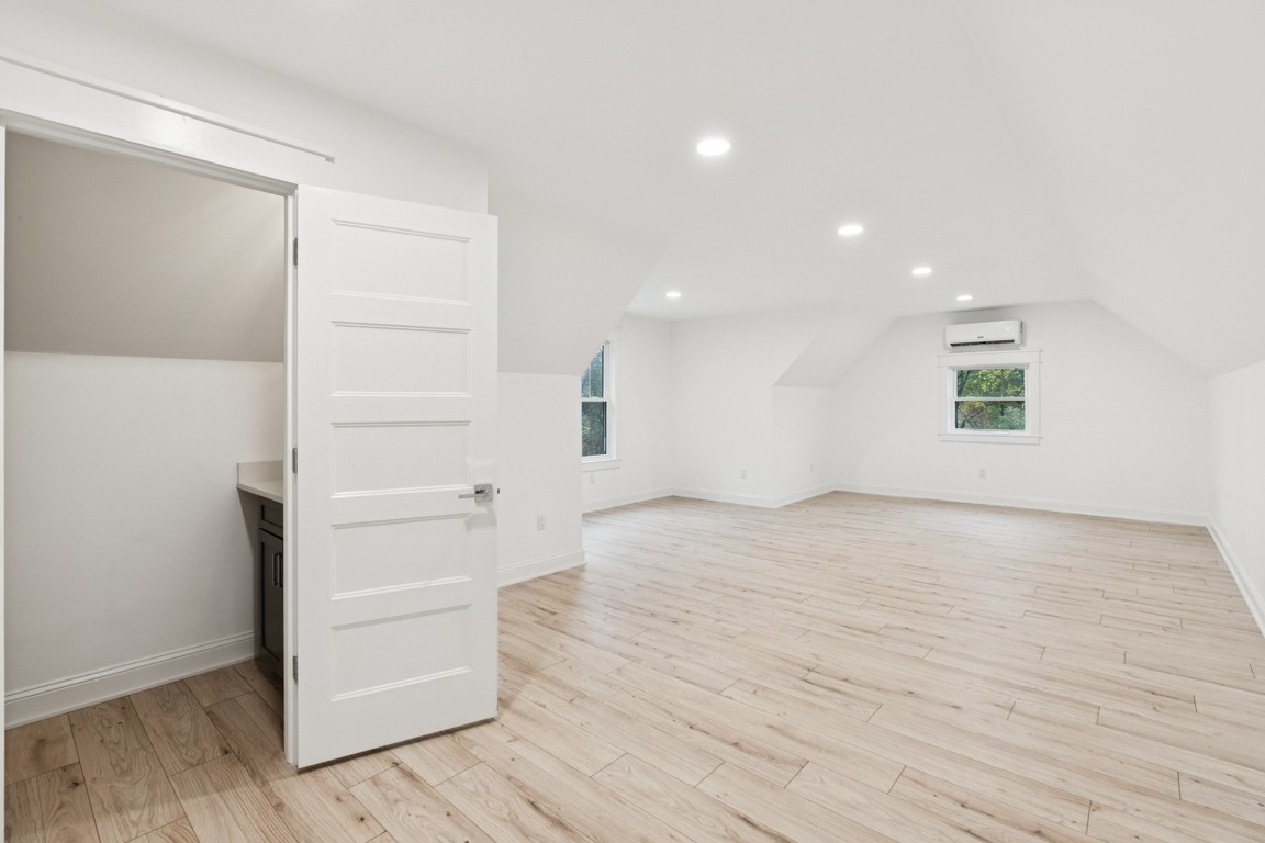 6461 Highway 48 North Cumberland Furnace, TN 37051 - Photo 23 of 25 a view of empty room with wooden floor and windows
