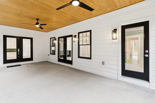 a view of an entryway with a ceiling fan