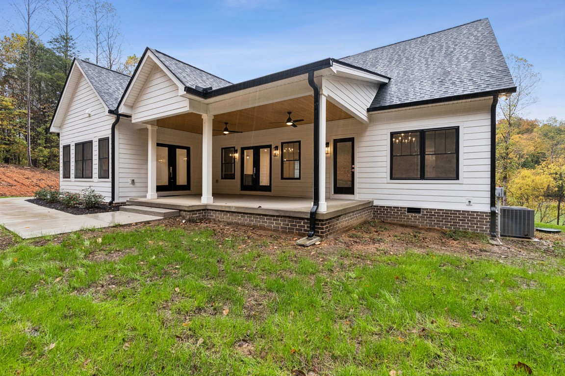 6461 Highway 48 North Cumberland Furnace, TN 37051 - Photo 25 of 25 a front view of a house with garden