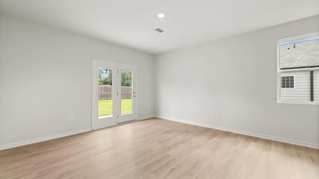 an empty room with windows