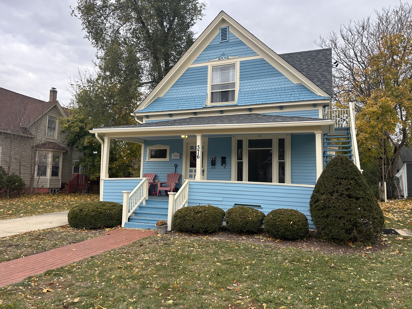 376 Jefferson Avenue Elgin, IL 60120 - Photo 1 of 21 a view of a house with a yard in front of it