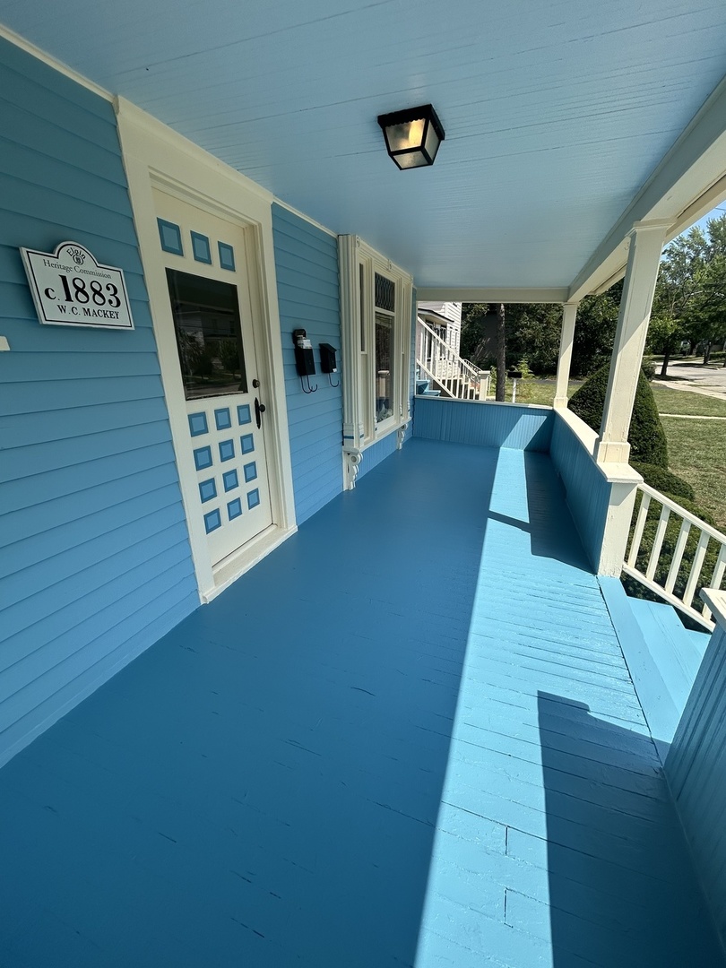 376 Jefferson Avenue Elgin, IL 60120 - Photo 2 of 21 a view of entryway and hall with wooden floor